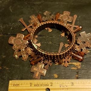 Expandable copper colored bracelet.